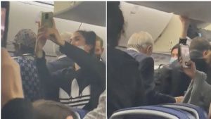 Entre pocos aplausos y muchos abucheos, reciben a AMLO en avi&oacute;n de regreso a M&eacute;xico