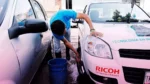 Lavacoches del centro de Puebla podrán seguir trabajando solo en zonas permitidas